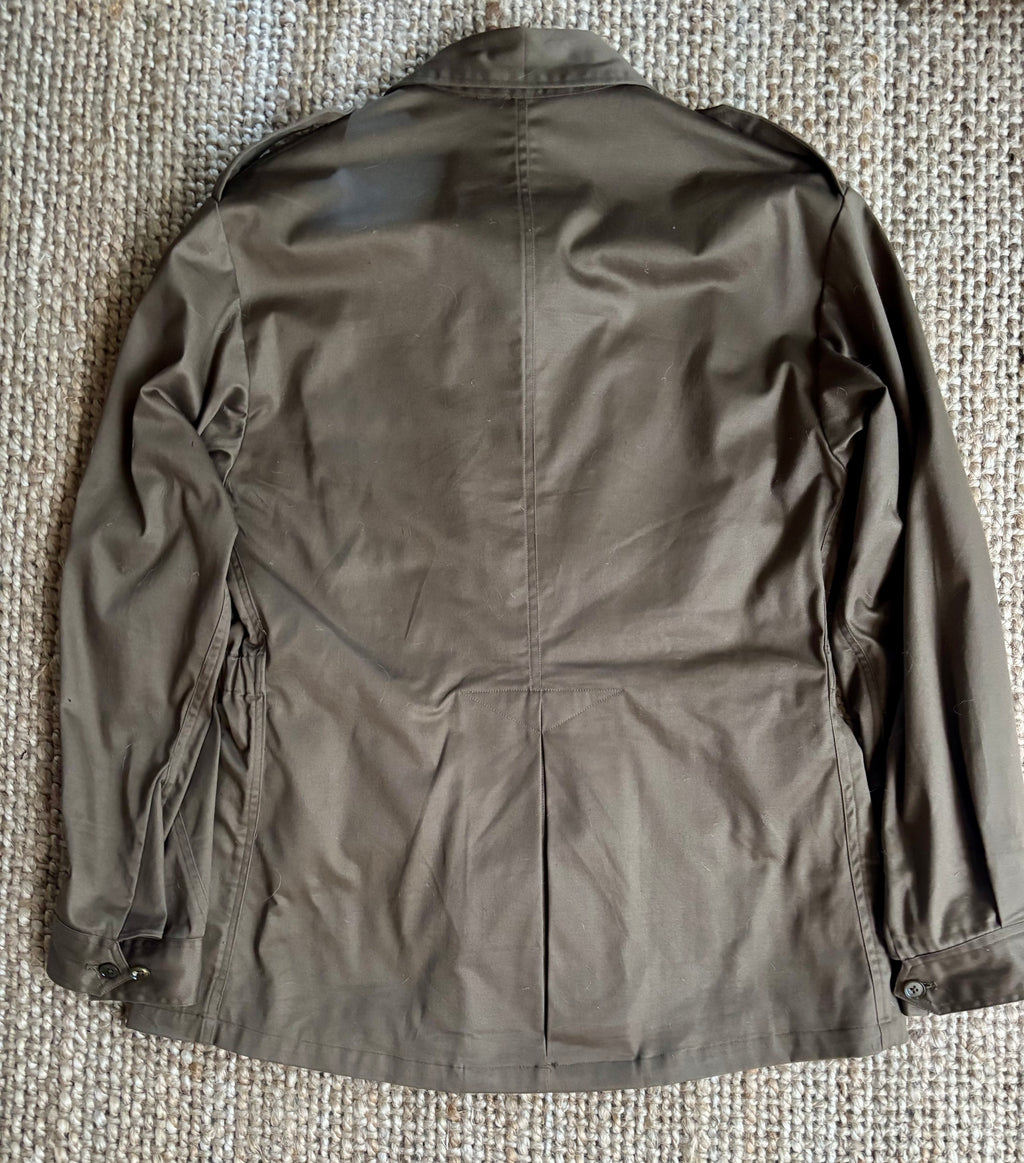 Brown jacket on a textured surface